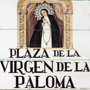 Madrid traditional: Earthenware plaque of Virgen de la Paloma square