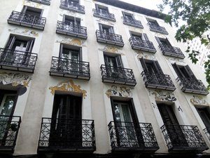 Madrid Letters; front of a building painted by Mingote